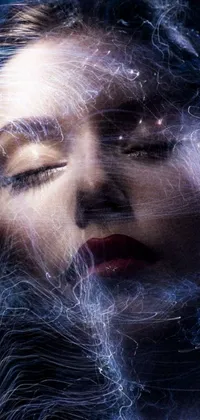 This one-of-a-kind live wallpaper features an awe-inspiring close up of a woman's face with closed eyes