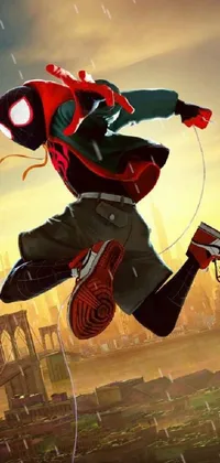 Become the ultimate Spidey fan with this awesome phone live wallpaper! Featuring the iconic superhero from the animated blockbuster "Spider-Man: Into the Spider-Verse", this trendy wallpaper showcases the heroic jumping pose of Spider-Man at dusk against a beautiful sunset backdrop