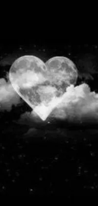 This stunning live wallpaper features a vintage black and white photograph of a heart-shaped cloud in a dark, tumblr-esque night sky
