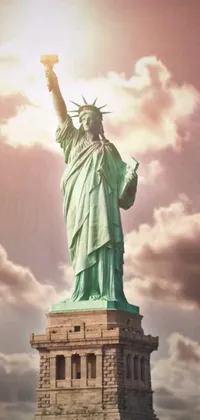 This phone live wallpaper features the Statue of Liberty on a cloudy day