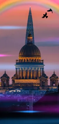 This phone live wallpaper showcases a stunning city skyline at sunset with a tall building and spire