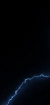 This stunning phone live wallpaper features an enigmatic male figure standing against a dark background, enveloped by intense and vivid blue indigo thunder lightning