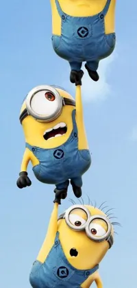 Get ready to fly with the adorable minions in this phone live wallpaper! Watch as they perform daring acrobatics, soaring through the air with joy and mischief
