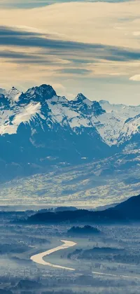 This live wallpaper depicts a valley with mountains in the background