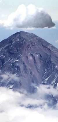 This stunning phone live wallpaper depicts a realistic mountain with a volcanic texture and a cloud hovering over it