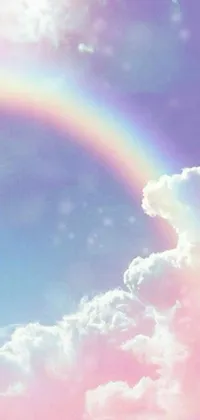 This live wallpaper for your phone displays a vibrant rainbow across the sky