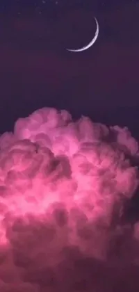 This captivating live wallpaper features a mesmerizing pink cloud in the sky with a crescent moon and a nuclear explosion