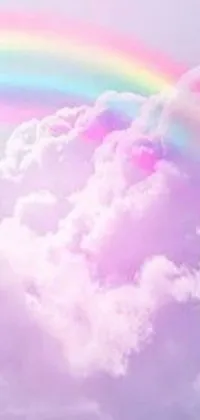 Bring the magic of a rainbow into your phone with this stunning live wallpaper! Watch as the bright colors of pink, purple, blue, yellow and green blend together seamlessly to create a vibrant display of natural beauty