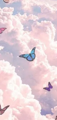 This trippy phone live wallpaper features a collection of vividly colorful butterflies, hovering over a tranquil backdrop of fluffy clouds