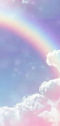 This phone live wallpaper showcases a picturesque rainbow stretching over a cloudy sky with major arcana symbols in the air