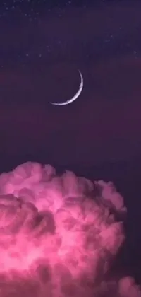 This phone live wallpaper features a serene, pink cloud in the sky with a glowing crescent moon at its center