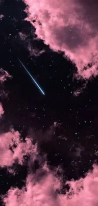This phone live wallpaper features a pink cloud and shooting star in a space art background