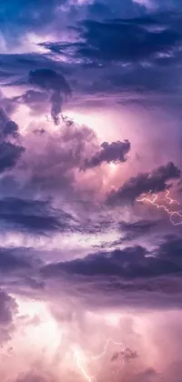 This live wallpaper features a stunning cloud illuminated with lightning bolts and godrays