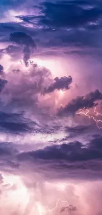 This stunning phone live wallpaper features a large cloud illuminated by bolts of lightning that strike at random