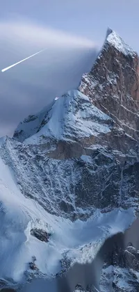 Experience the beauty of a snow-covered mountain at the peak of winter with this beautiful live wallpaper for your phone