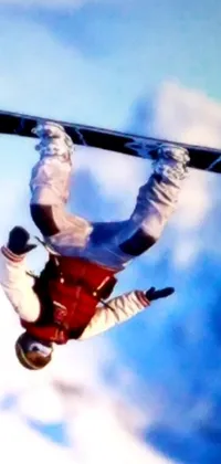 This phone wallpaper features digital art depicting a man snowboarding through the air