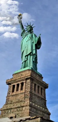 Looking for a stunning live wallpaper for your phone? Check out our Statue of Liberty wallpaper, featuring a beautiful depiction of the iconic statue on top of a building