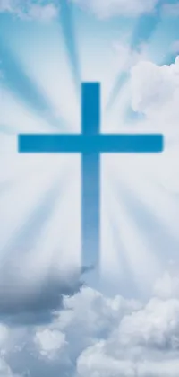 This live wallpaper showcases a striking blue cross set against a backdrop of white and gray clouds