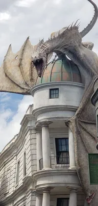 Transform your phone into a mysterious, enchanting wonderland with this captivating live wallpaper featuring a dragon statue on top of a building, perfect for fans of fantasy