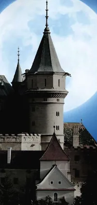 This live wallpaper features a haunting castle silhouetted against a full moon and set against a foreboding landscape