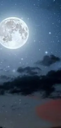 This captivating phone live wallpaper depicts a bright full moon shining in the night sky, with silver stars and clouds swirling around it
