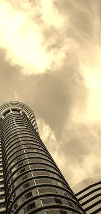This live wallpaper features a black and white photograph of a towering skyscraper with vintage sepia tones