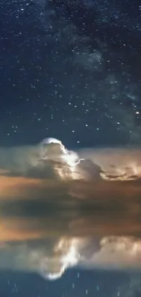 This phone live wallpaper showcases a mesmerizing digital art of a serene night sky with sparkling stars, heavenly bodies, shooting comets and thunderstorms with lighting