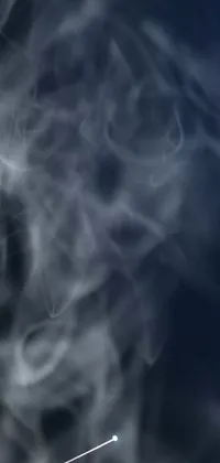 This cigarette live wallpaper showcases a close-up of a smoke emitting cigarette