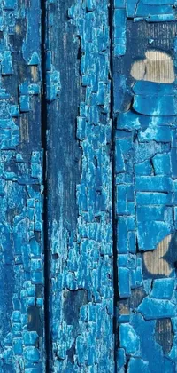 This phone live wallpaper features a close-up of a wooden surface with peeling paint in an auto-destructive art style