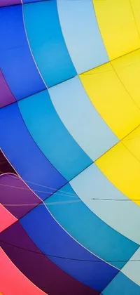 This phone live wallpaper showcases the inside of a colorful hot air balloon in stunning detail