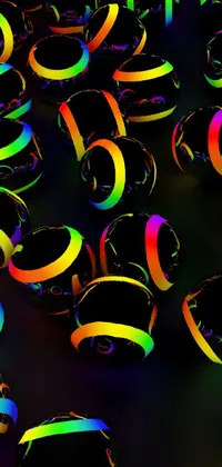 This phone live wallpaper features a dynamic array of glowing balls in gold, black, and rainbow colors that rotate and move in response to your phone's movements, creating a 3D effect reminiscent of high-tech camera lenses