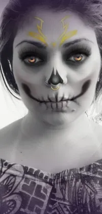 This stunning live phone wallpaper features a digital rendering of a woman with a remarkable skeletal face paint