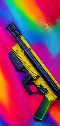 This lively phone live wallpaper showcases a vivid yellow and black bullpup style gun set against a vibrant, colorful background