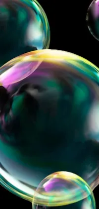 This phone live wallpaper depicts a group of colored bubbles stacked on top of each other against a black backdrop