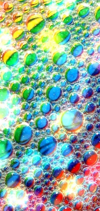 This live wallpaper for your phone showcases a stunning close-up of a multicolored bubble
