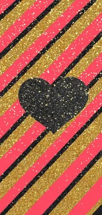 This live wallpaper features a black heart set on a pink and gold striped background, with inspiration drawn from glitter backgrounds, Snapchat photo filters, and gothic elements