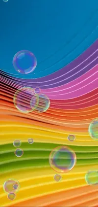 Spruce up your phone screen with this dynamic live wallpaper featuring a bright and cheerful wave of colorful paper
