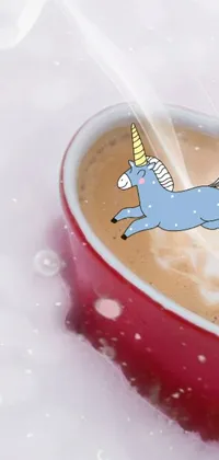 This phone live wallpaper features a heart-shaped unicorn coffee cup that is sure to catch everyone's attention