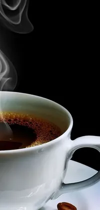 This live wallpaper depicts a romantic image of coffee in a cup and saucer, with thick dark smoke rising and delicate white steam on the side