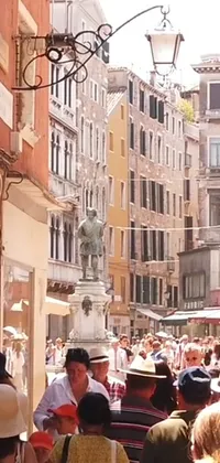 This live wallpaper captures the essence of a busy city street, with towering buildings and a classical statue