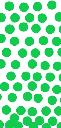 Looking for a lively and energetic live wallpaper that's perfect for summer? Look no further than this green polka dot pattern on a white background! The playful design features Yayoi Kusama-inspired op art, with green dots that create a sense of movement and depth