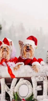 This phone live wallpaper showcases two cute dogs sitting in snowy scenery on a wooden Santa icon