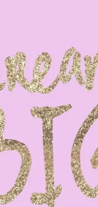 Looking to add some shine and motivation to your mobile device? Look no further than this stunning phone live wallpaper! Set against a pink background, the phrase "dream big" is written in shimmering gold glitter that catches the eye and captures the imagination