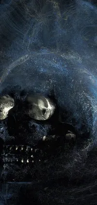 This stunning phone live wallpaper features a highly detailed, ghostly blue skull emitting smoke