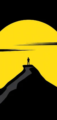 This phone live wallpaper features a minimalist black and yellow silhouette of a person standing triumphantly atop a mountain, rendered in vector art