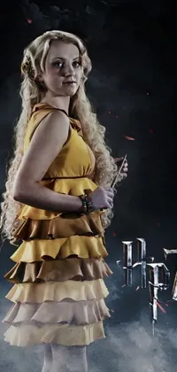This live wallpaper features a bold image of a confident woman wearing a bright yellow dress while holding a sharp knife