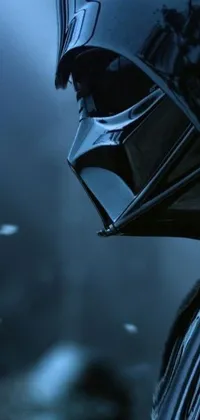 This phone live wallpaper captures a close up of a Darth Vader helmet for Star Wars enthusiasts to adorn on their phone