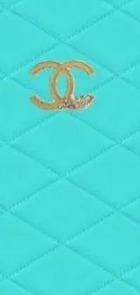 The phone live wallpaper presents a stunning Blue Purse with an exquisite gold logo