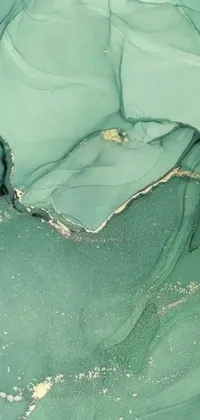This phone live wallpaper showcases a mesmerizing close-up of a green marble surface