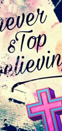 This live wallpaper for your phone features a stunning cross design with the encouraging phrase "never stop believing"